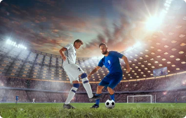 Two men playing football in a stadium